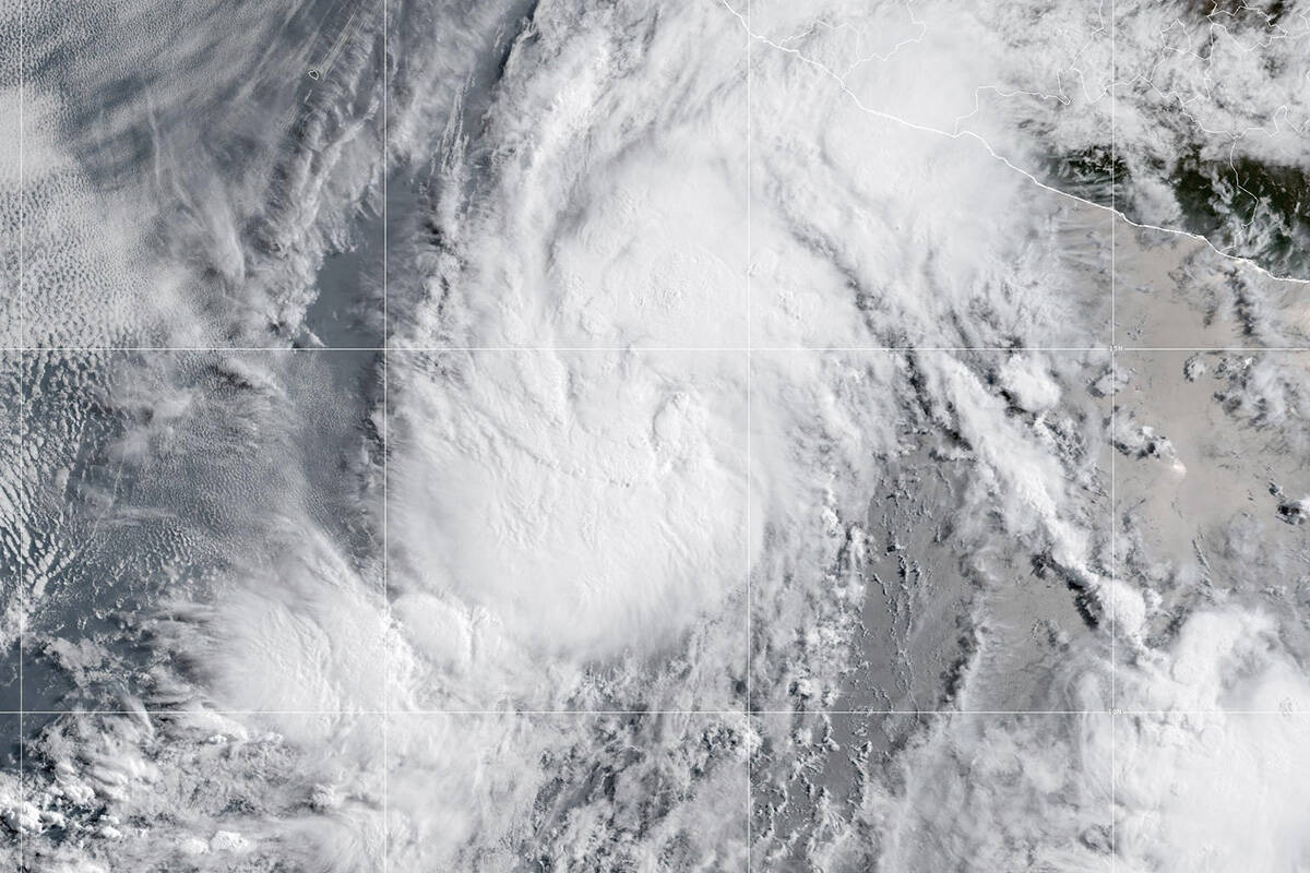 This satellite image provided by the National Oceanic and Atmospheric Administration (NOAA) sho ...