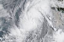 This satellite image provided by the National Oceanic and Atmospheric Administration (NOAA) sho ...