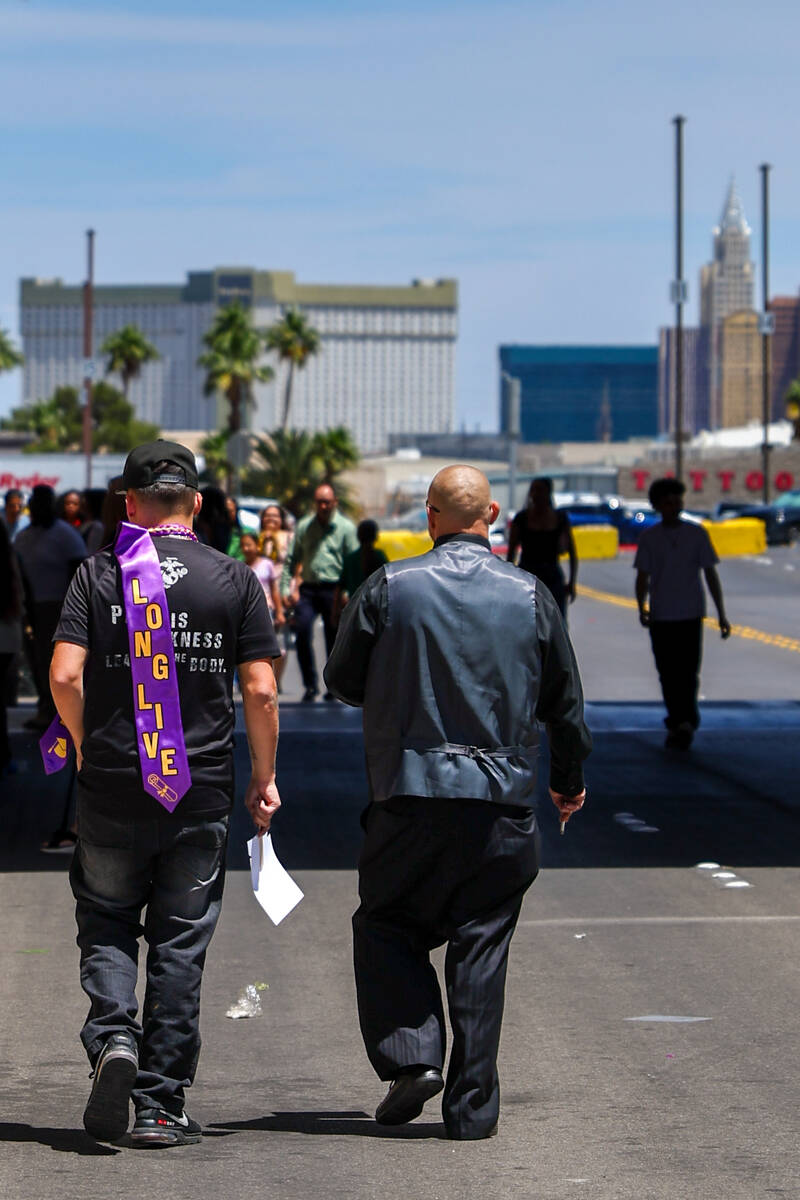 TJ Enright and Thomas Enright, Keanu’s brother and father, walk out of what would have b ...