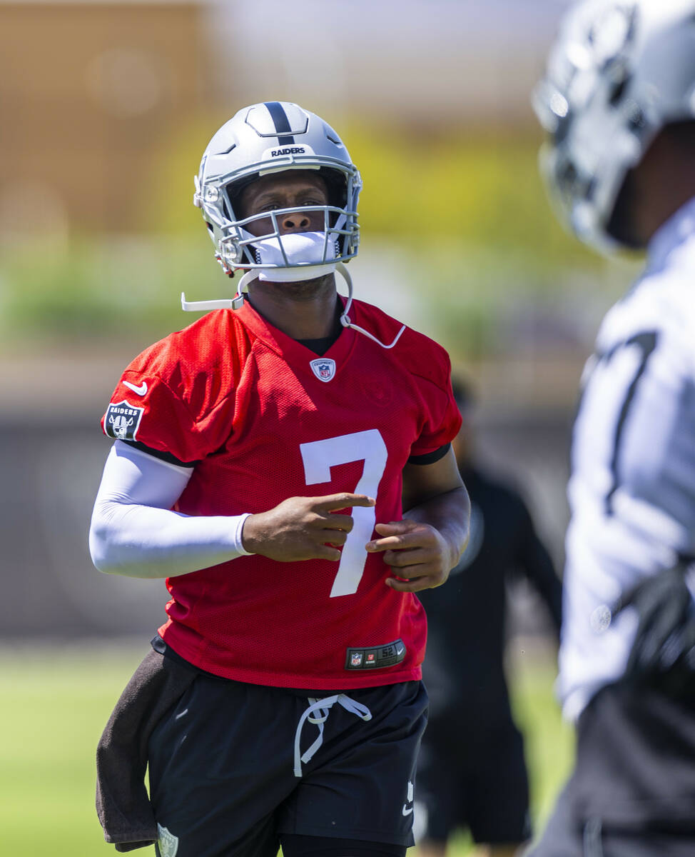 Raiders quarterback Geno Smith (7) warms up during Raiders OTA's at the Intermountain Health Pe ...