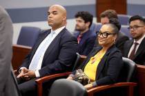 Justin Simpson and Arnelle Simpson, children of O.J. Simpson, listen during a court hearing reg ...