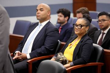 Justin Simpson and Arnelle Simpson, children of O.J. Simpson, listen during a court hearing reg ...