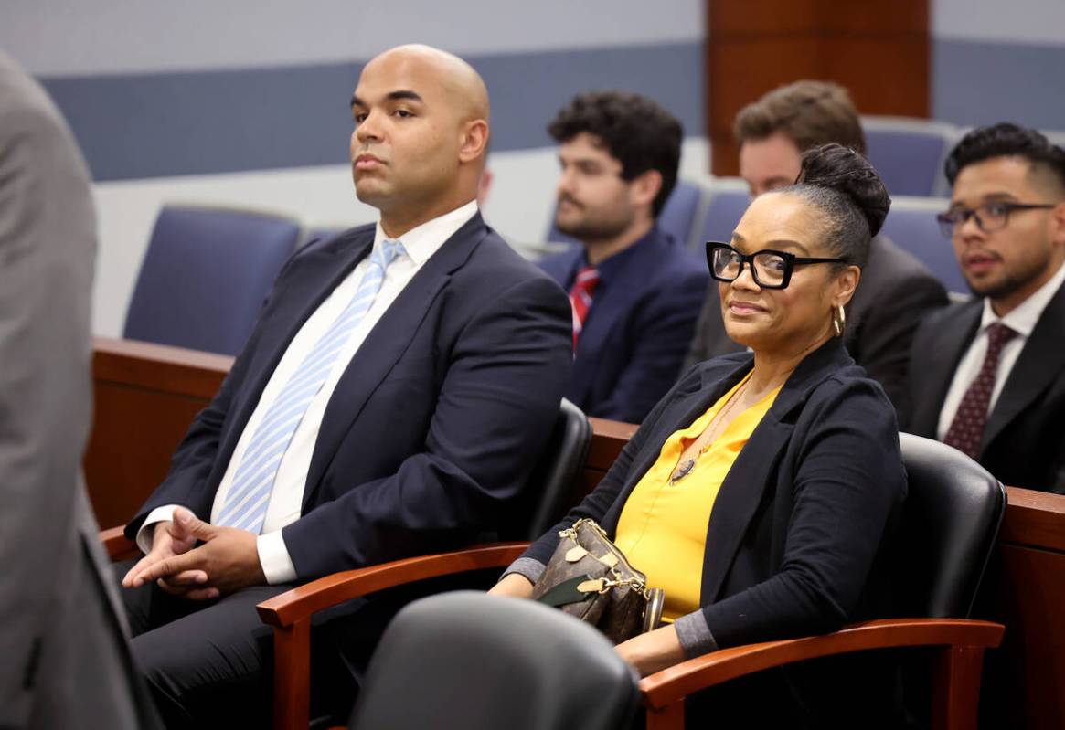 Justin Simpson and Arnelle Simpson, children of O.J. Simpson, listen during a court hearing reg ...