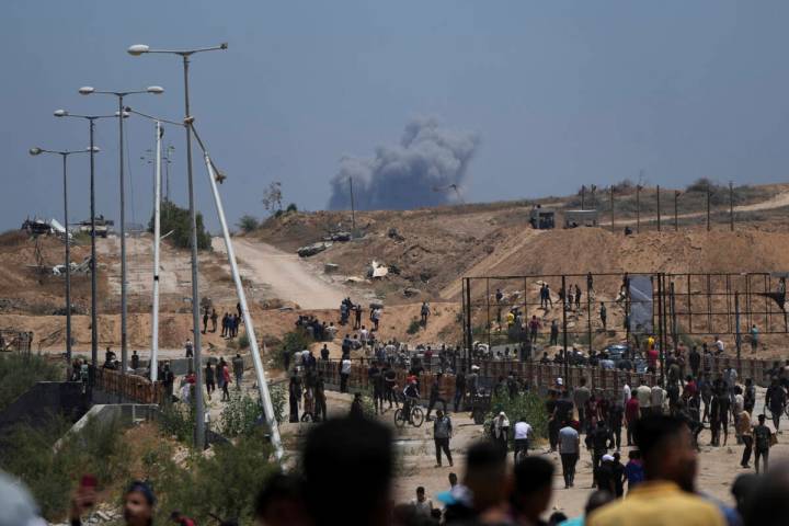 Smoke rises following an Israeli bombardment in southern Gaza, as seen from a humanitarian aid ...