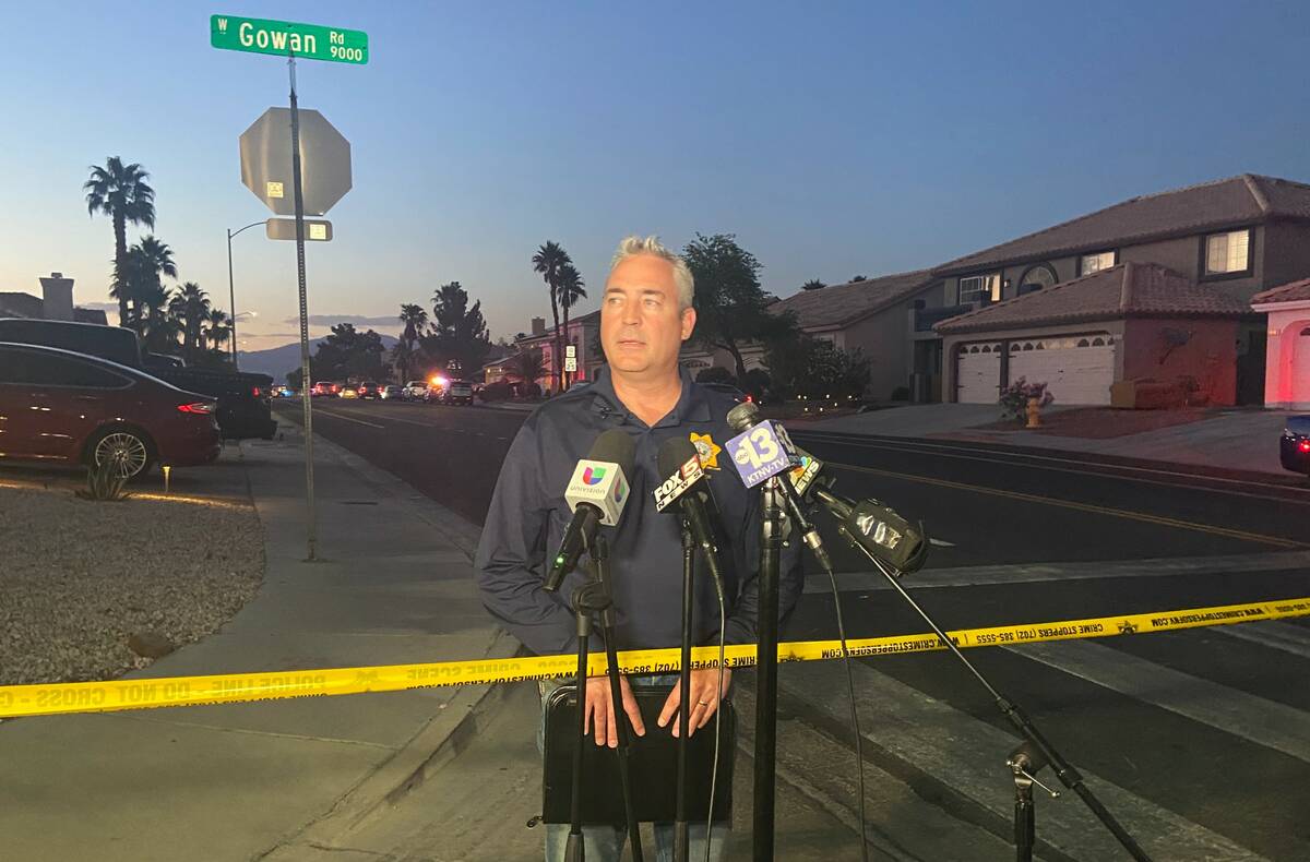 Lt. Robert Price speaks near the scene of a homicide in the 3600 block of North Campbell Road i ...