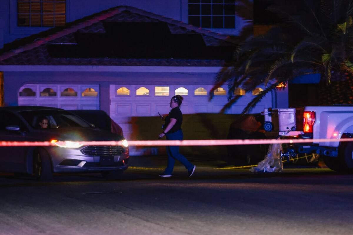 Police investigate a homicide in the 3600 block of North Campbell Road Thursday, May 29, 2025, ...