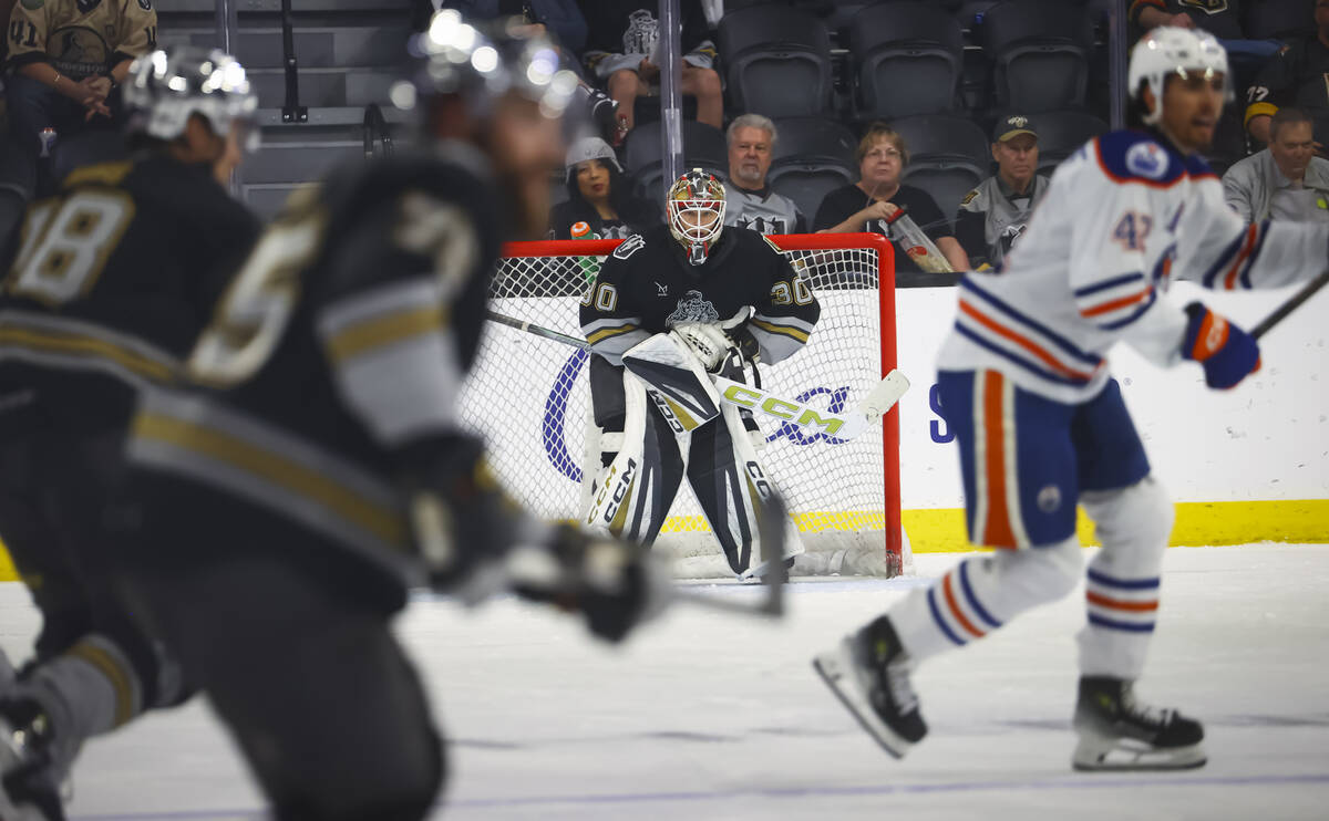Silver Knights goaltender Carl Lindbom (30) defends the net during an AHL hockey game against t ...