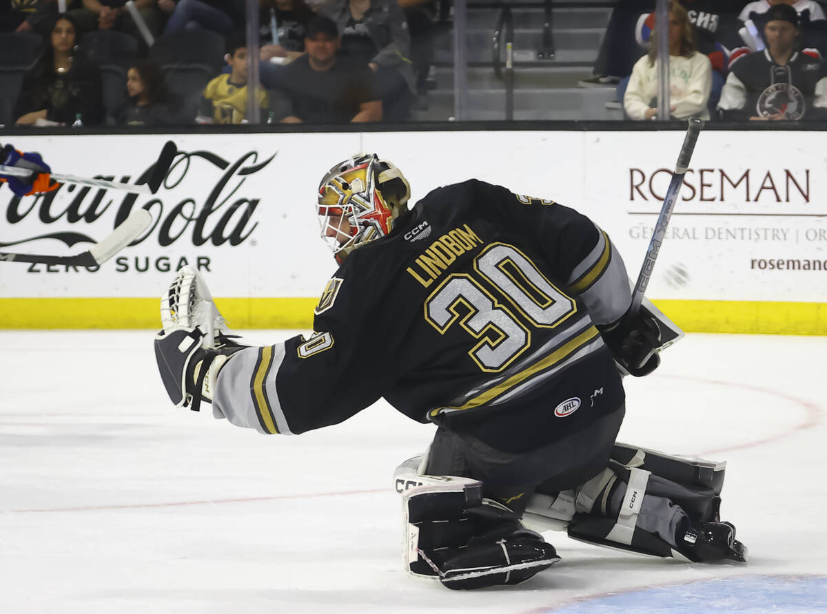 Silver Knights goaltender Carl Lindbom defends the net during an AHL hockey game against the Ba ...