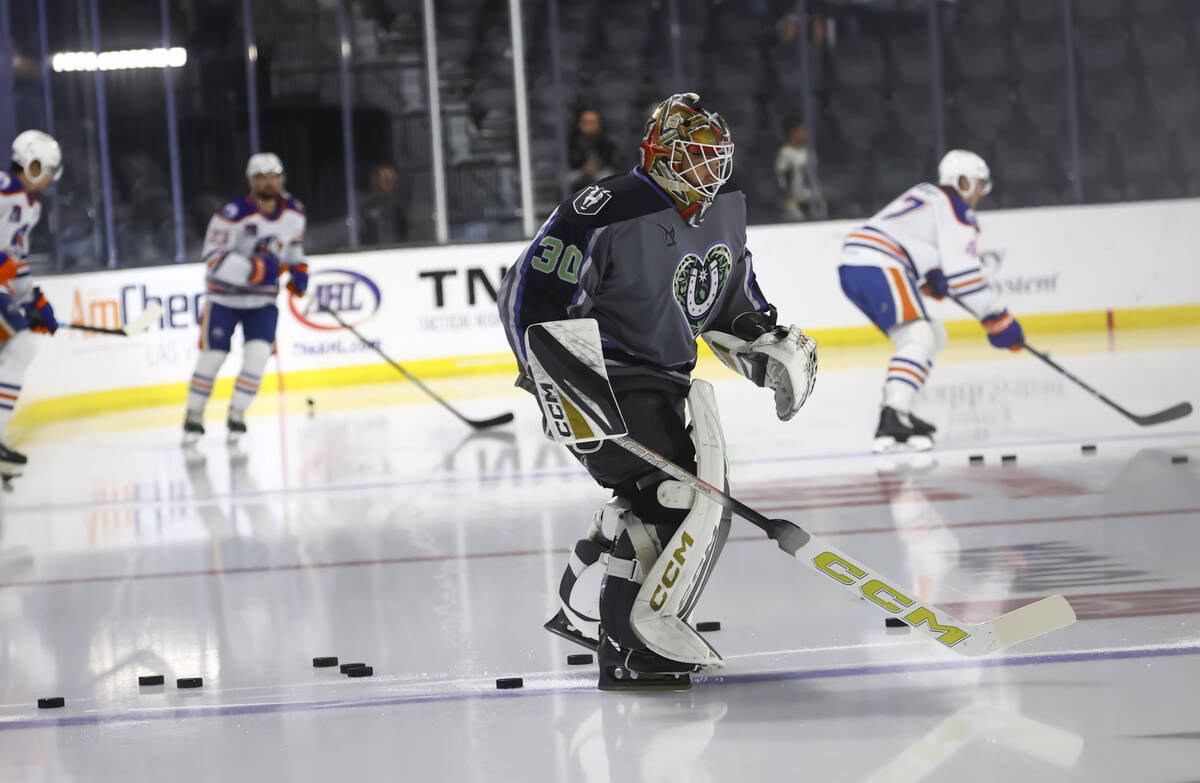Silver Knights goaltender Carl Lindbom skates onto the ice before an AHL hockey game against th ...