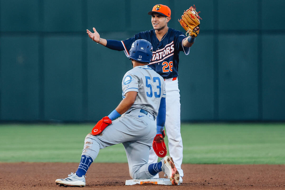 Aviators infielder Alejo Lopez (28) gestures to an umpire after Oklahoma City Dodgers outfielde ...