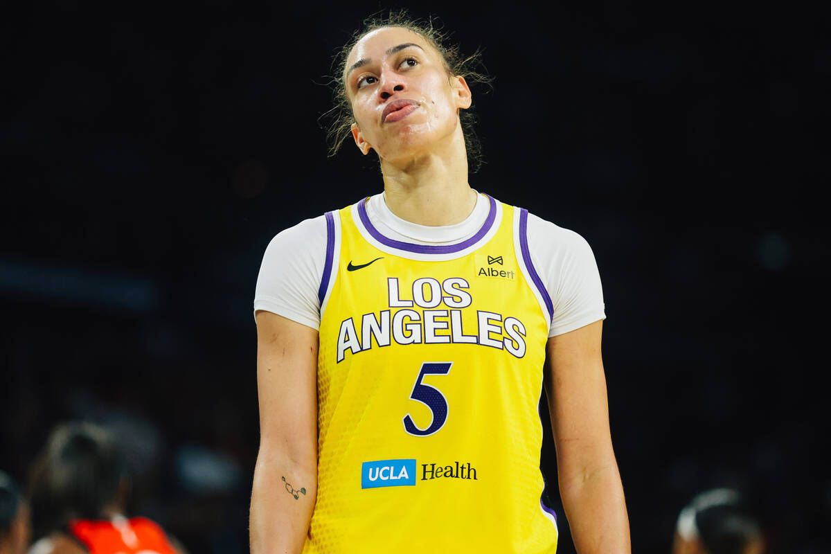 Los Angeles Sparks forward Dearica Hamby (5) reacts to game play during a WNBA basketball game ...