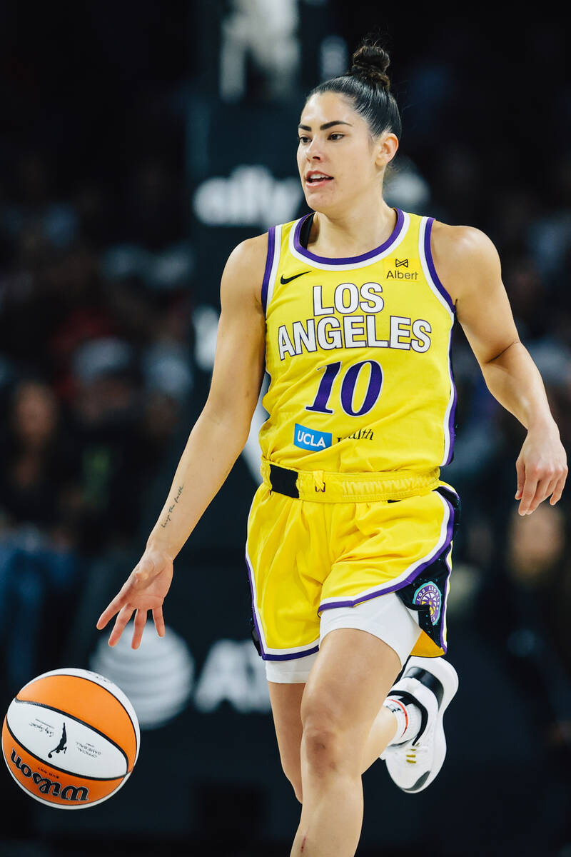Los Angeles Sparks guard Kelsey Plum (10) dribbles the ball during a WNBA basketball game betwe ...