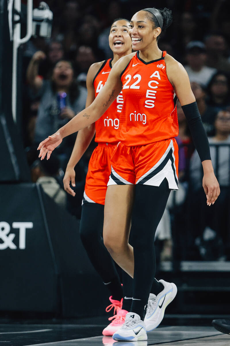 Aces center A'ja Wilson (22) celebrates making basket and being fouled during a WNBA basketball ...