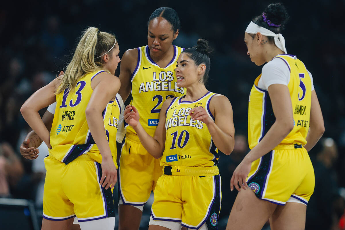 Los Angeles Sparks guard Kelsey Plum (10) speaks to her teammates during a WNBA basketball game ...