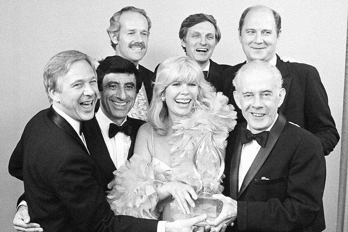 FILE - Cast members from "M*A*S*H," foreground from left, William Christopher, Jamie ...