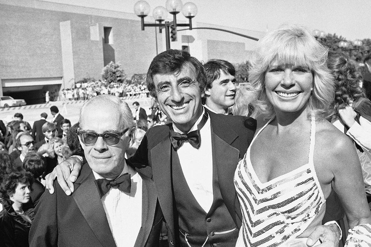 From left to right: Harry Morgan, Jamie Farr and Loretta Swit, members of the cast of televisio ...