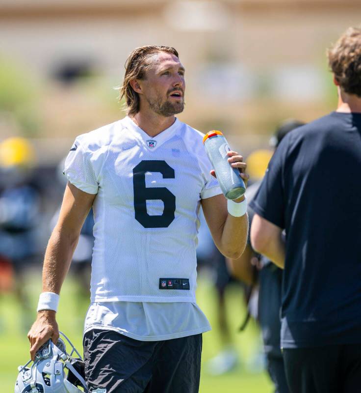 Raiders punter AJ Cole (6) talks to teammates during OTA's at the Intermountain Health Performa ...