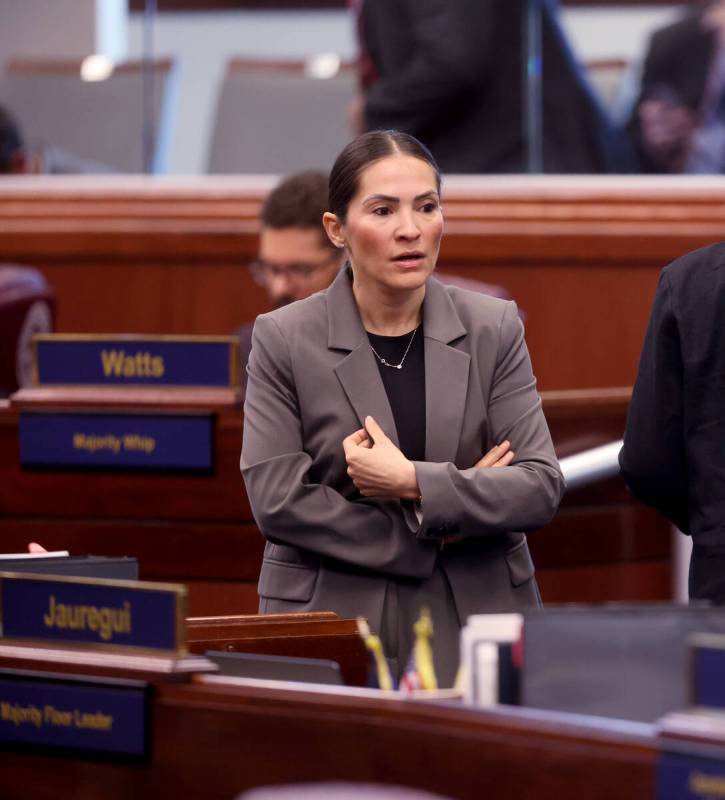 Assembly member Sandra Jauregui, D-Las Vegas, talks with colleagues before a floor session in t ...