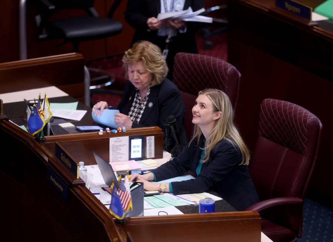 Senators Marilyn Dondero Loop, D-Las Vegas, left, and Melanie Scheible, D-Las Vegas, work durin ...