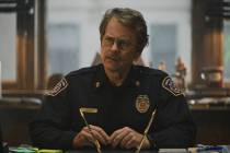 This image released by Apple TV+ shows Greg Kinnear in a scene from "Smoke." (Apple T ...