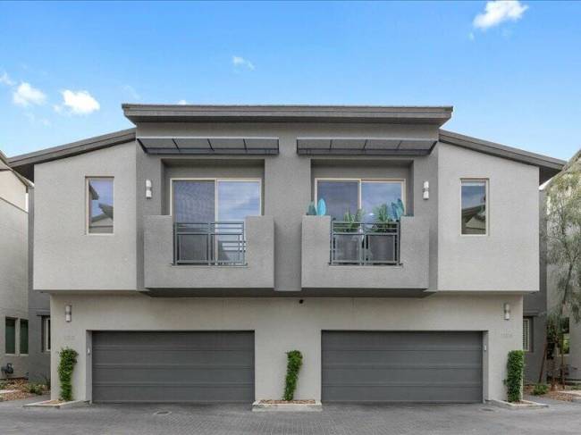 This three-story “luxury townhome,” according to the listing, at 11315 Gravitation Drive is ...