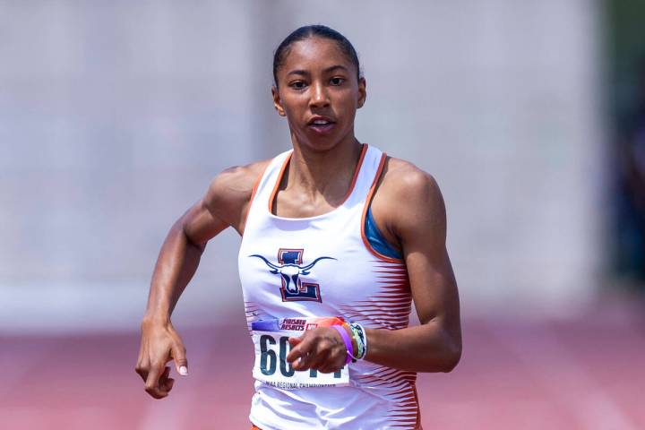 Legacy's Amaya Stepp cruises to a win in the girls 200 meter dash during the Class 5A Southern ...