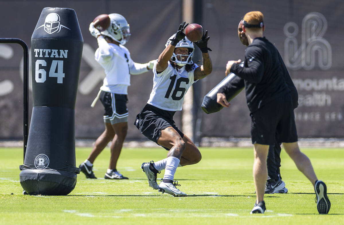 Raiders wide receiver Jakobi Meyers (16) looks in a pass during OTA's at the Intermountain Heal ...