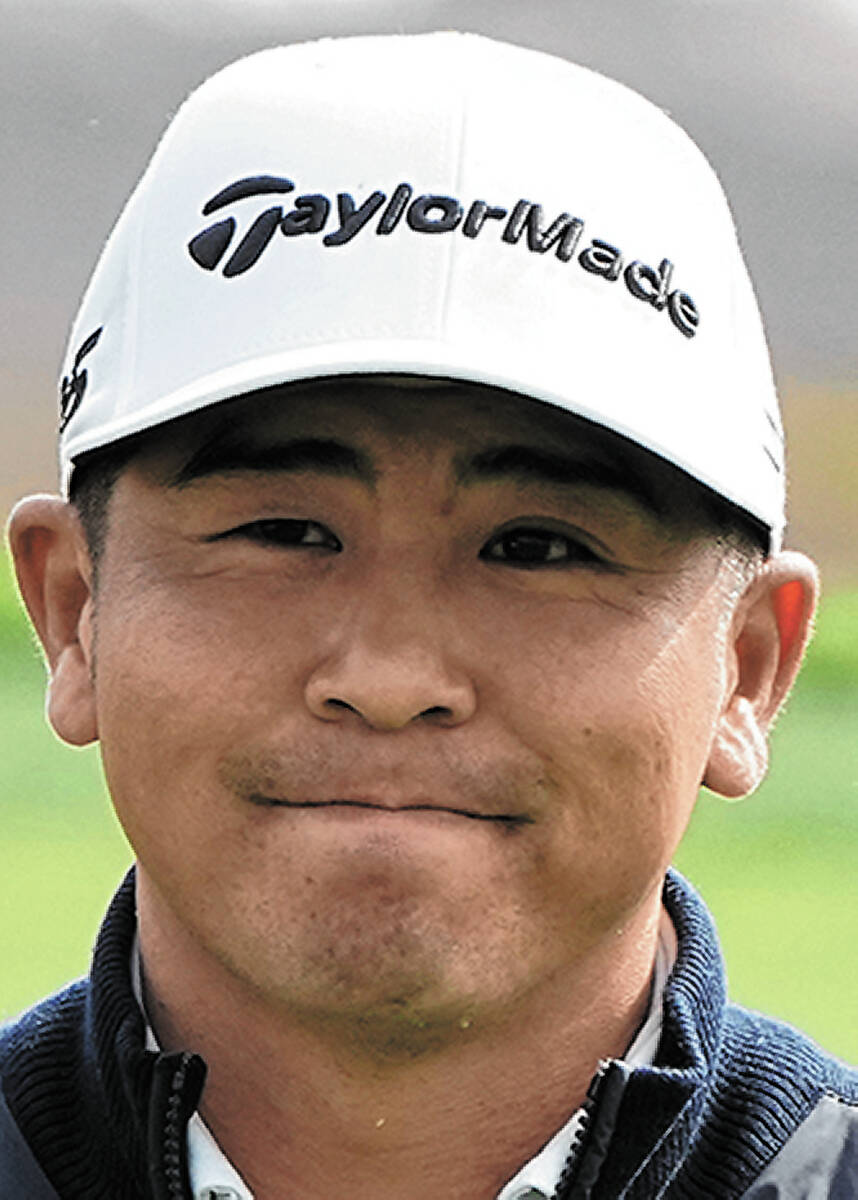 Kurt Kitayama waves after making a birdie putt on the eighth green of the Pebble Beach Golf Lin ...