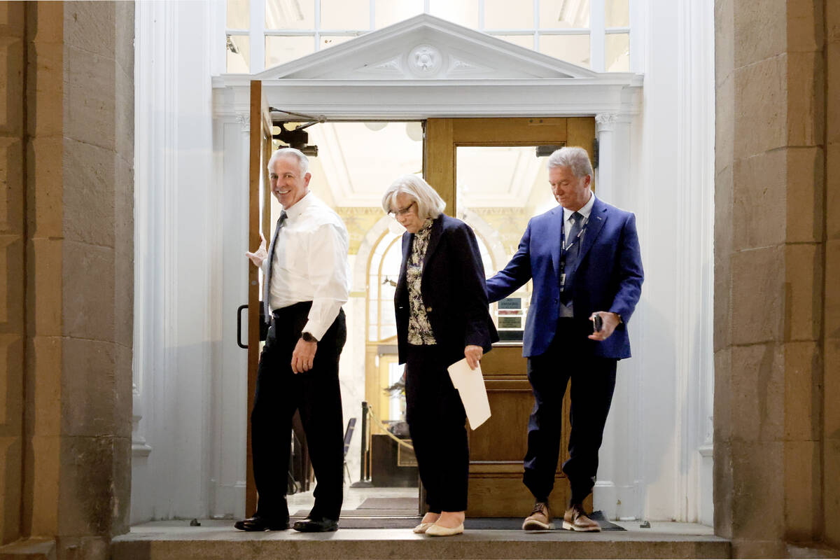 Gov. Joe Lombardo, left, and Sen. Roberta Lange, D-Las Vegas, emerge from the Capitol building ...