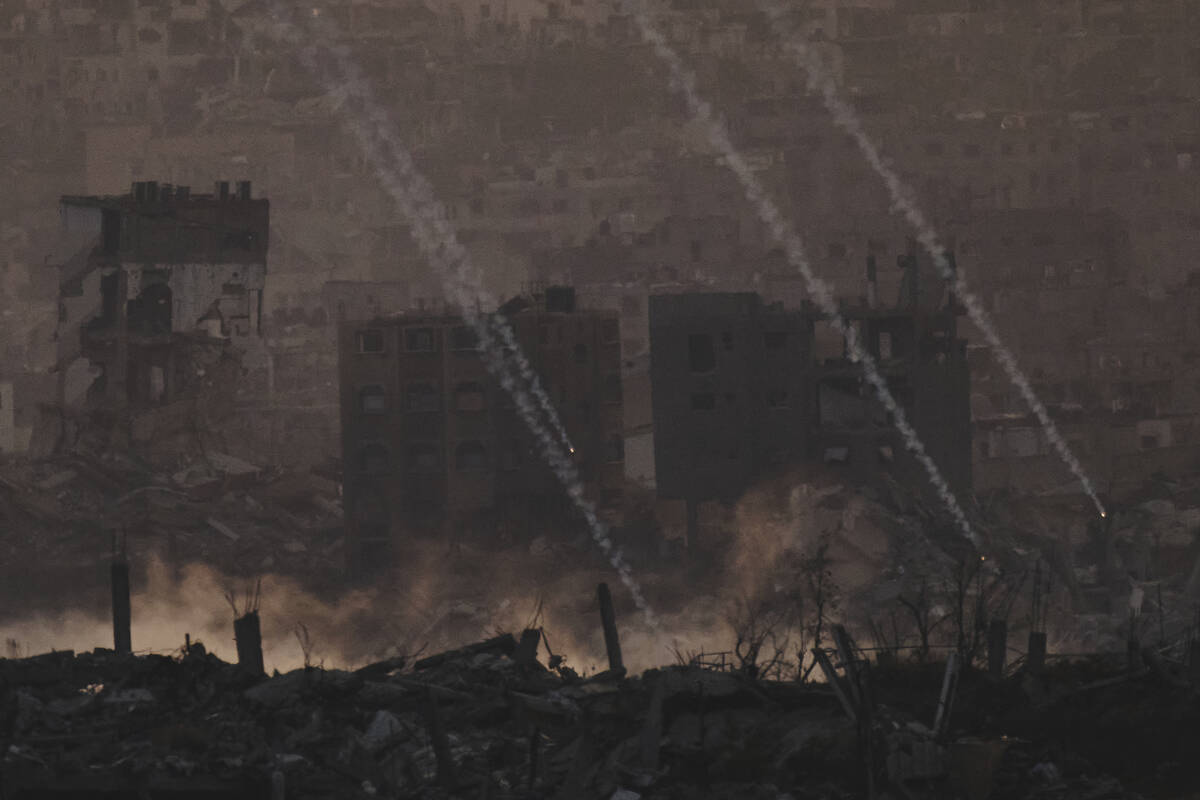 Israeli shelling hits an area in the northern of Gaza Strip as seen from southern Israel, Tuesd ...