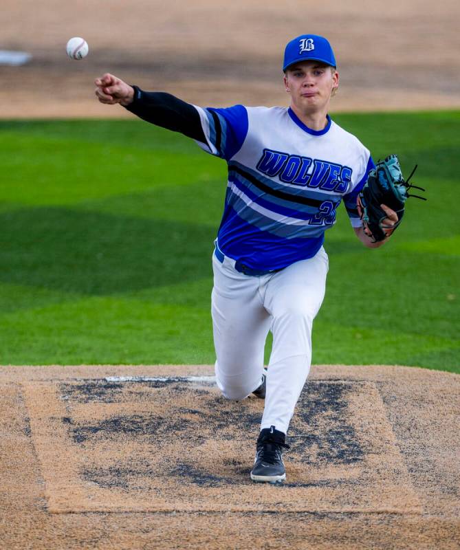 Basic pitcher Lincoln Evans (21) releases a throw to the plate against a Reno batter during day ...