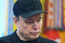 Elon Musk attends news conference with President Donald Trump in the Oval Office of the White H ...