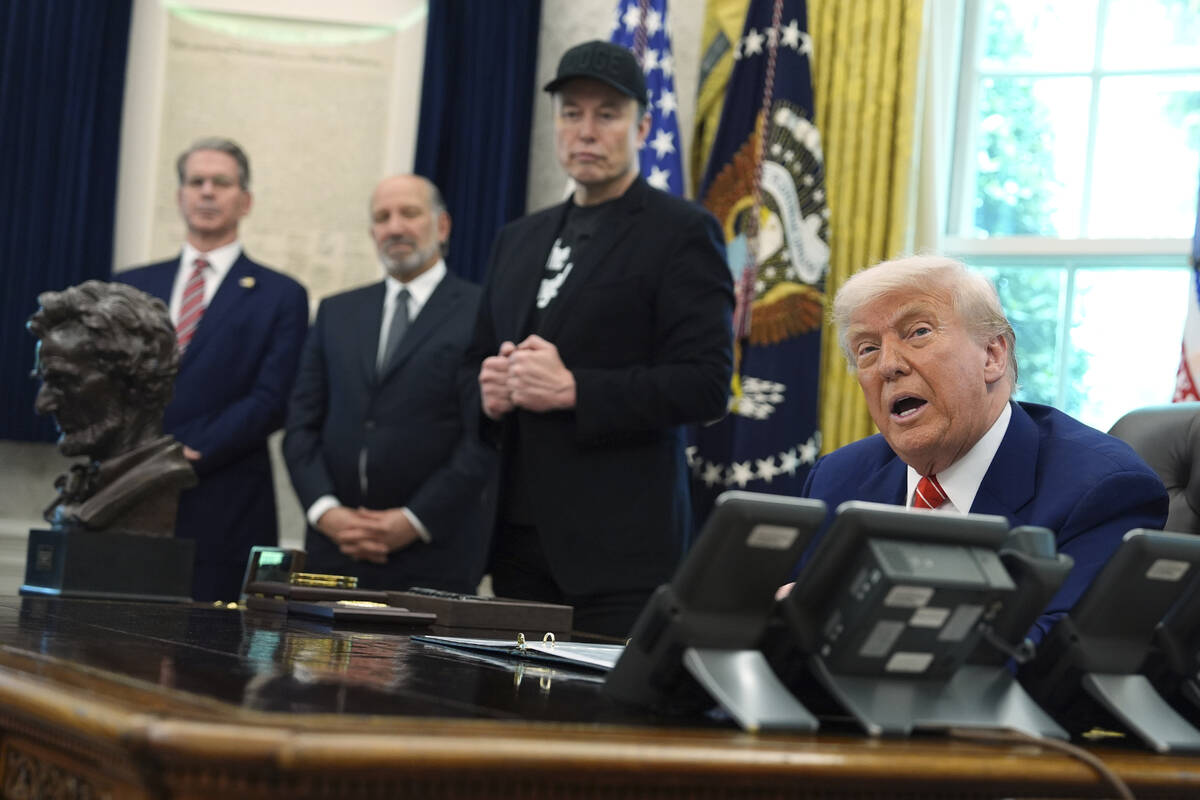 President Donald Trump, from right, speaks during a news conference with Elon Musk as Commerce ...