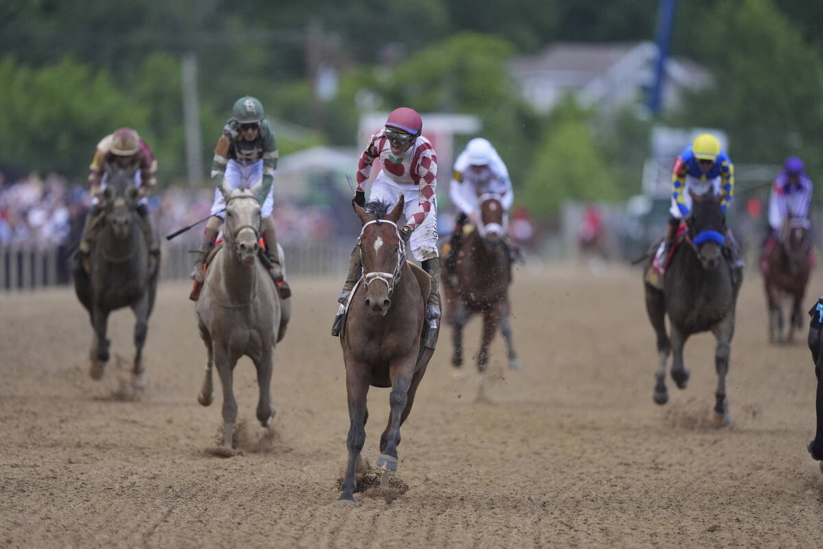 Umberto Rispoli, atop Journalism, during the 150th running of the Preakness Stakes horse race S ...
