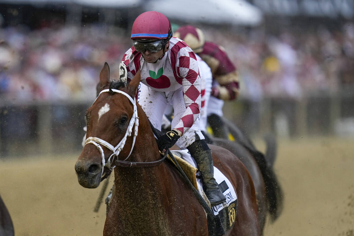 Umberto Rispoli, atop Journalism, participates in the 150th running of the Preakness Stakes hor ...