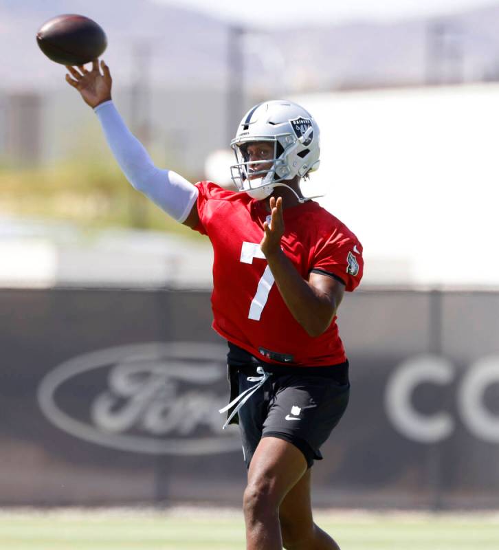 Raiders quarterback Geno Smith (7) throws the ball during organized team activities at the Inte ...