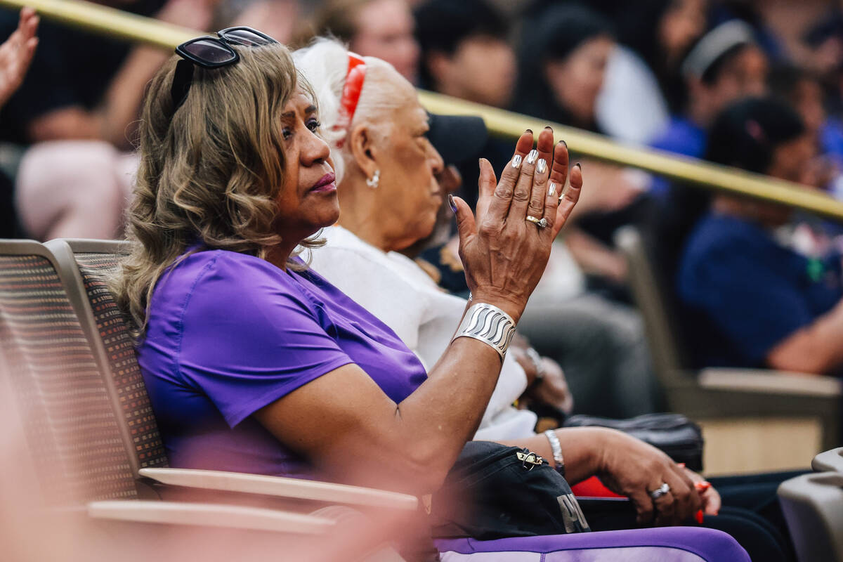 Member of the public clap as others finish speeches during a NV Energy consumer meeting at Clar ...