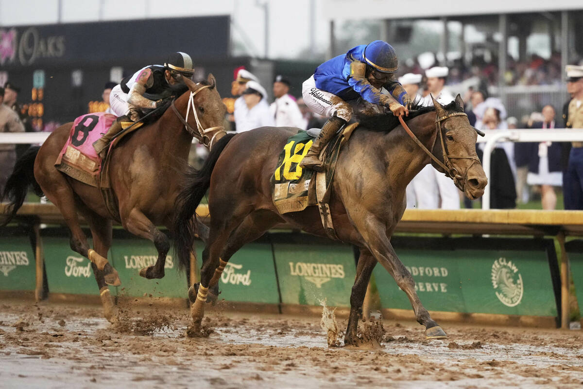 Sovereignty, right, ridden by Junior Alvarado, crosses the finish line to win the 151st running ...