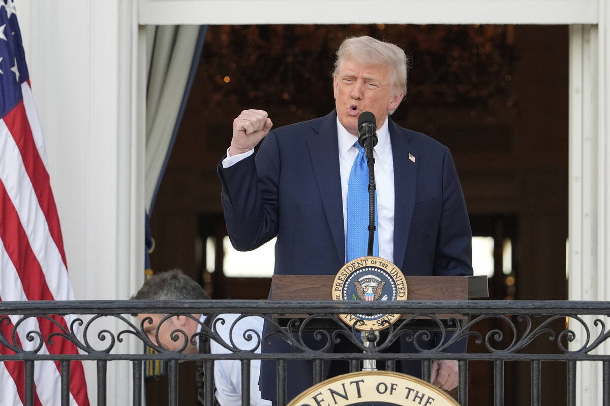President Donald Trump speaks during a summer soiree on the South Lawn of the White House, Wedn ...