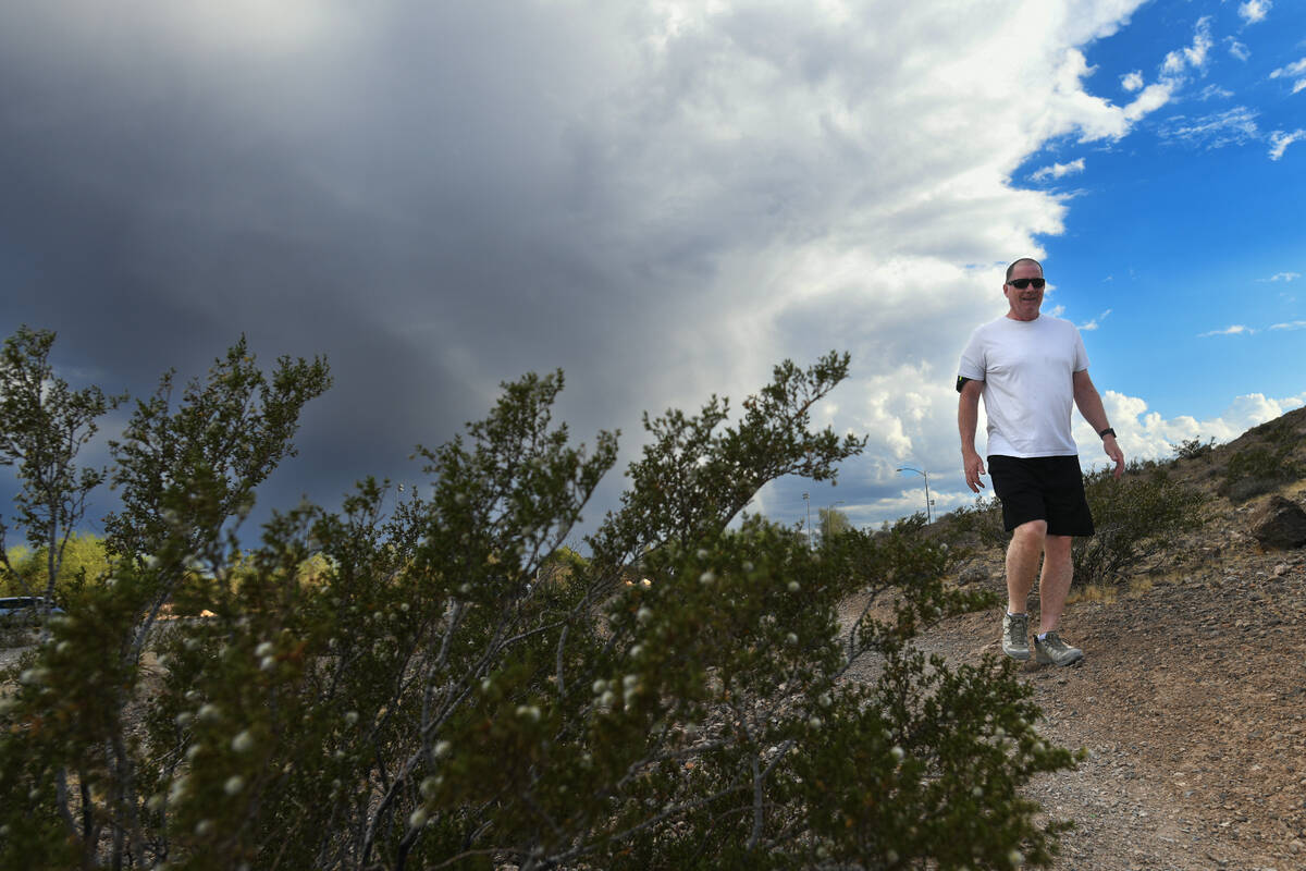 Nick Pavicic takes his afternoon walk at Lone Mountain Regional Park Wednesday, June 4, 2025, i ...