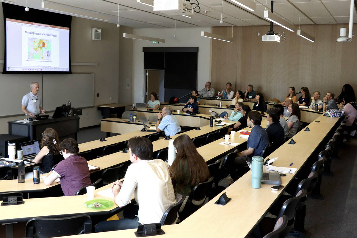 University of Nevada, Reno, professor and Deputy State Climatologist Tom Albright speaks to att ...