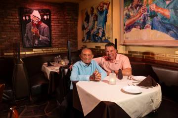 Freddie Glusman, left, poses for a portrait with Steve Siegel of The Siegel Group at Piero's It ...