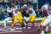 USC Trojans quarterback Jayden Maiava (14) gets off a pass from the end zone as Texas A&M A ...