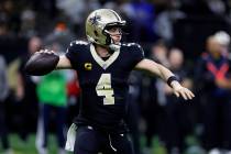 New Orleans Saints quarterback Derek Carr (4) prepares to throw a pass during the second half o ...