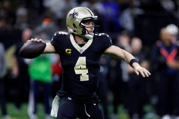 New Orleans Saints quarterback Derek Carr (4) prepares to throw a pass during the second half o ...
