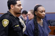 Markeisha Foster, accused of causing death of Reba the bulldog, is led out of a courtroom after ...