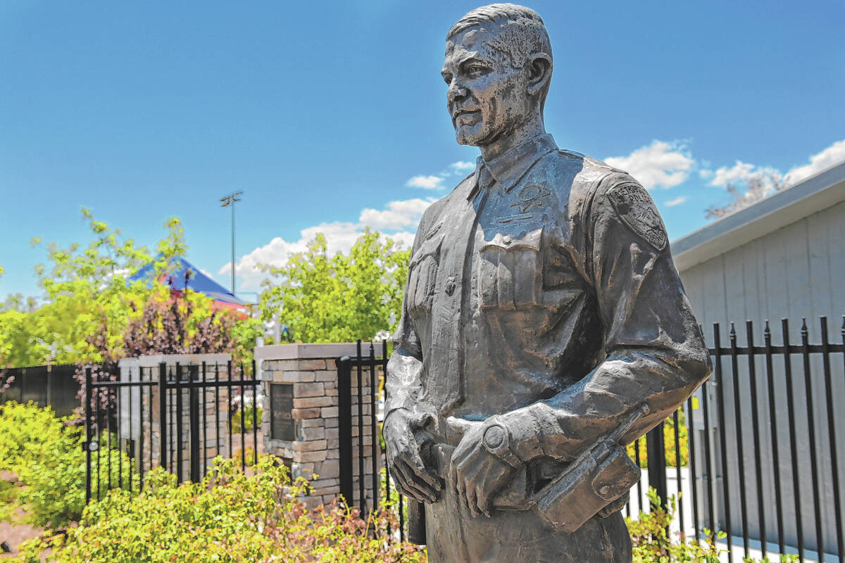 A statue of Officer Alyn Beck is seen at the entrance to Officer Alyn Beck Memorial Park in Las ...