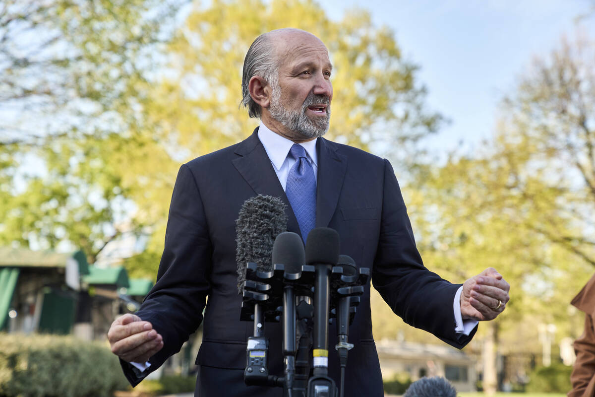 Commerce Secretary Howard Lutnick speaks to reporters outside the West Wing of the White House, ...