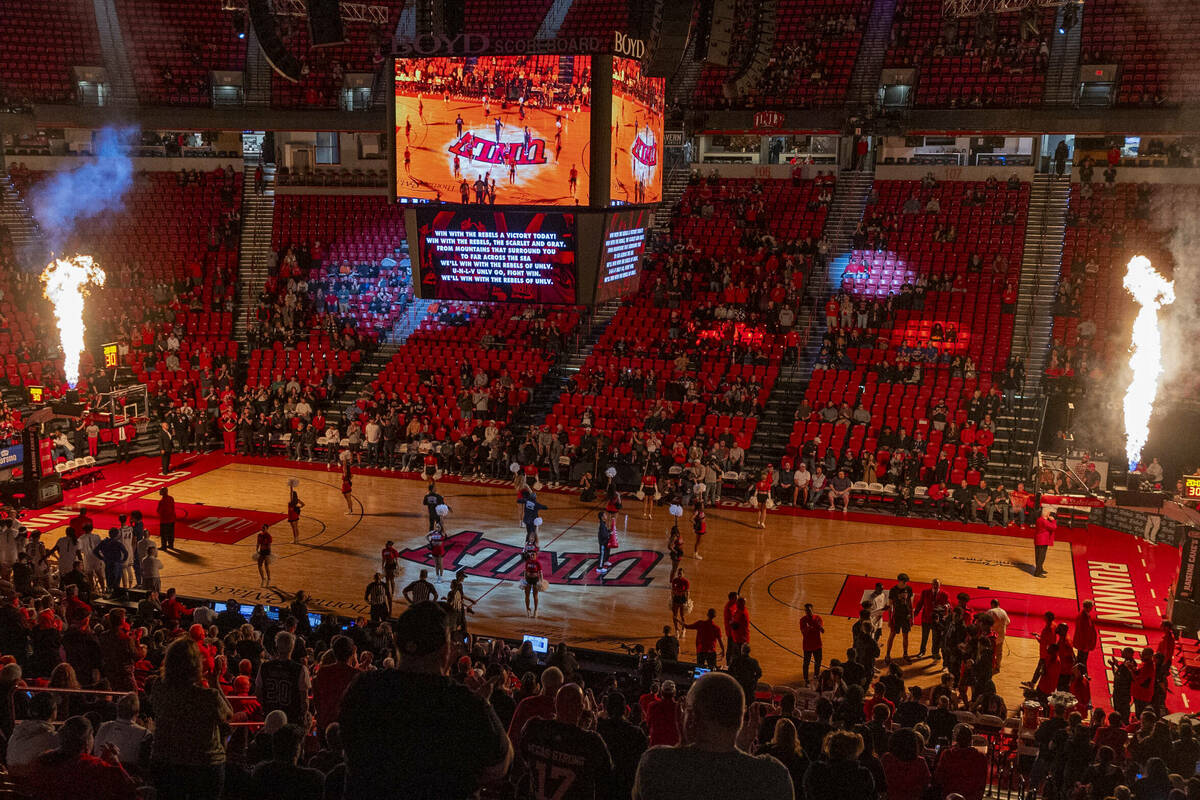 Flames erupt above the baskets as UNLV is introduced to play the Boise State Broncos in their N ...