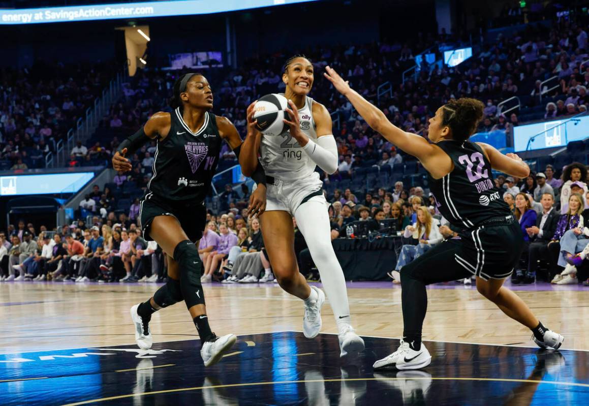 Golden State Valkyries center Temi Fagbenle (14) and guard Veronica Burton (22) defend against ...
